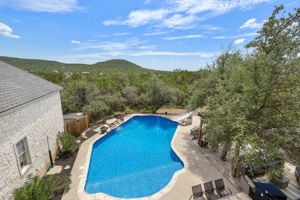 Sweeping view of hill country and pool