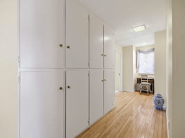 Center hall plan with an abundance of storage.