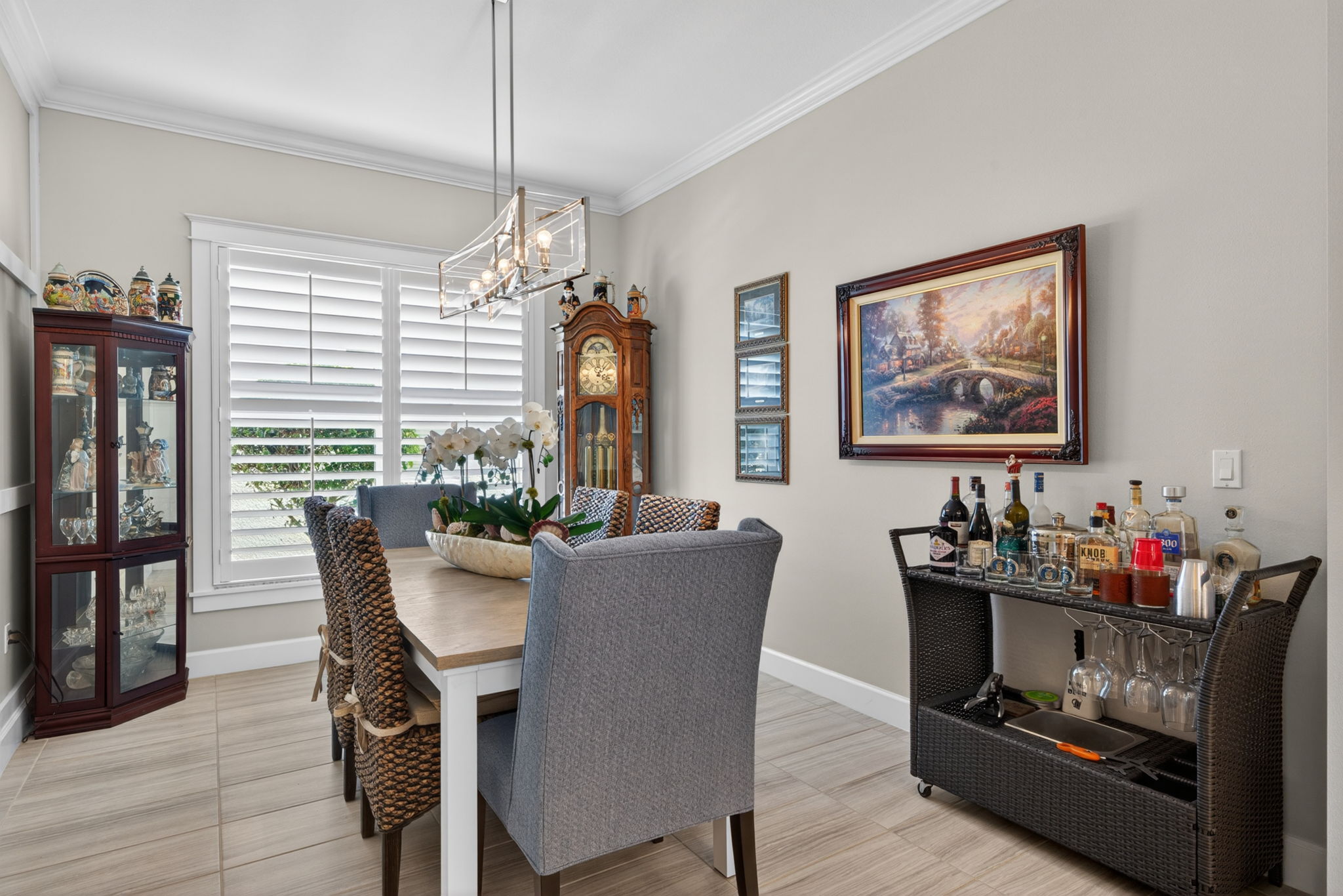 For dinner parties and holidays...extra seating for 8 here! Plantation shutters convey!