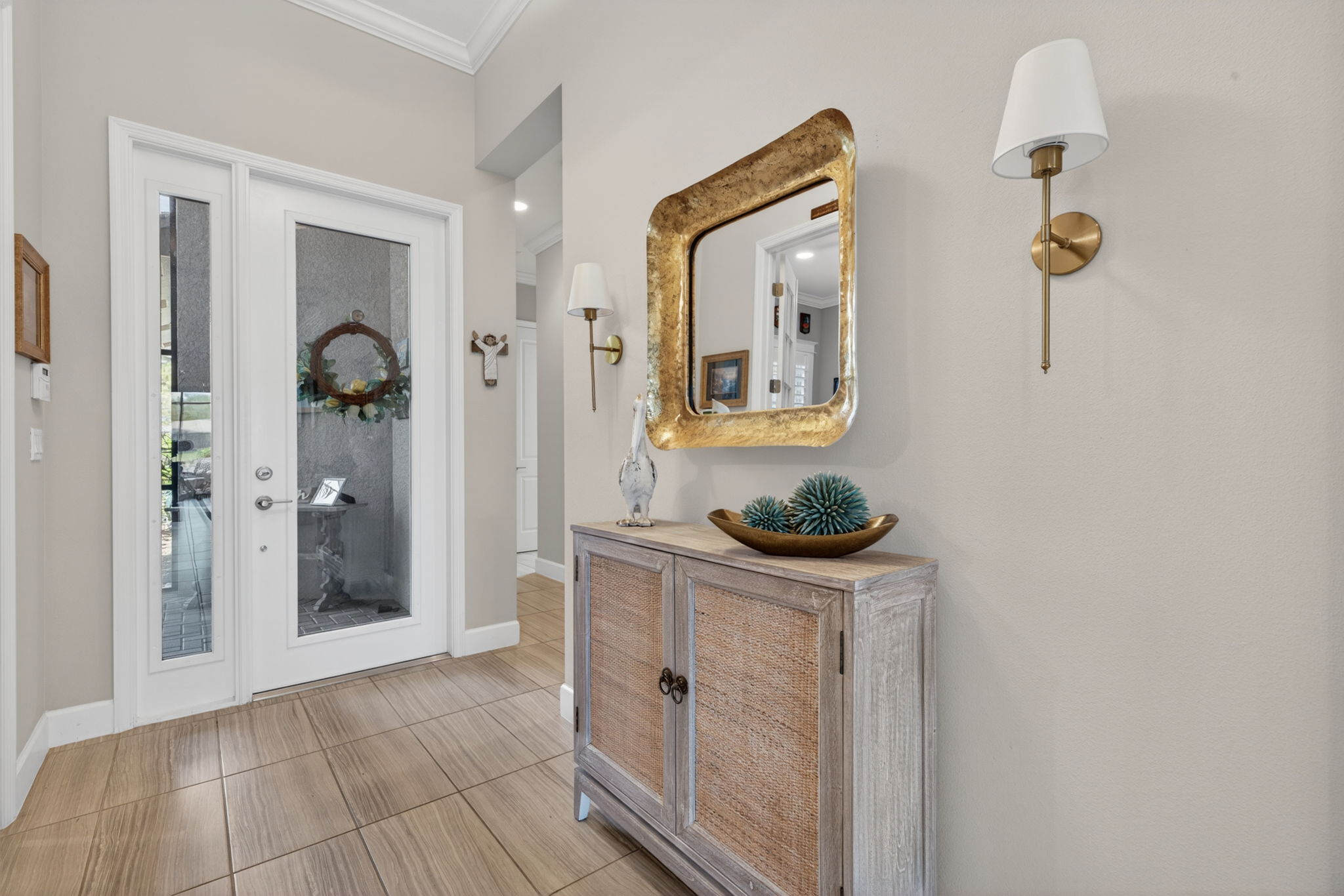 WELCOME to your new home! Spacious foyer and 1st look at gorgeous plank tile flooring!