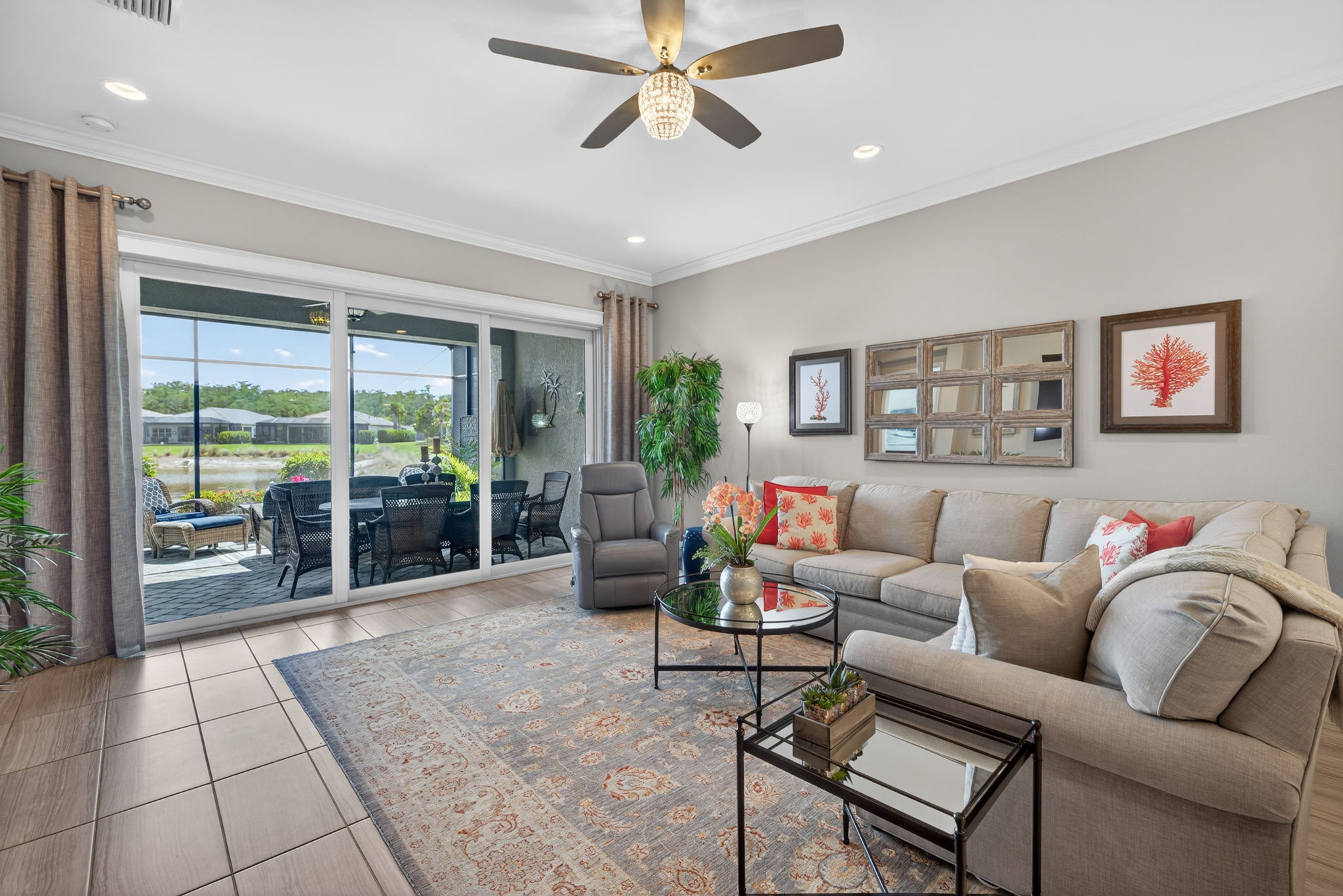 Great room opens off of kitchen and flows into THE maximum allowable expansion of lania for villas...and the cage was expanded as well!