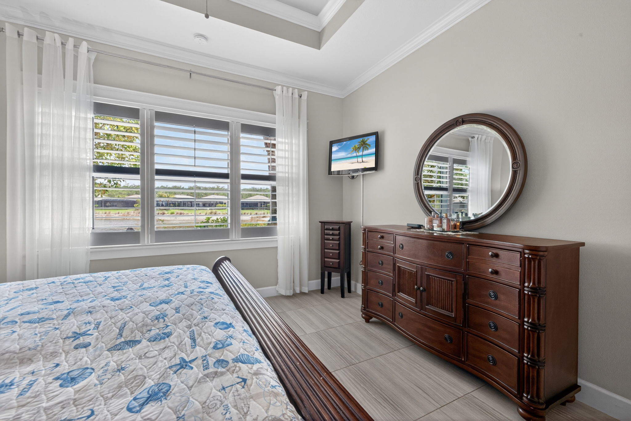 Window treatments to convey. Beautiful plantation shutters present.