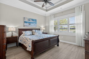 Located in the rear of this home, this primary bedroom has a lake view!!!
