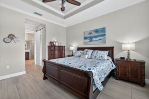 Featuring a tray ceiling, 2 walk-in closets plus a water view!