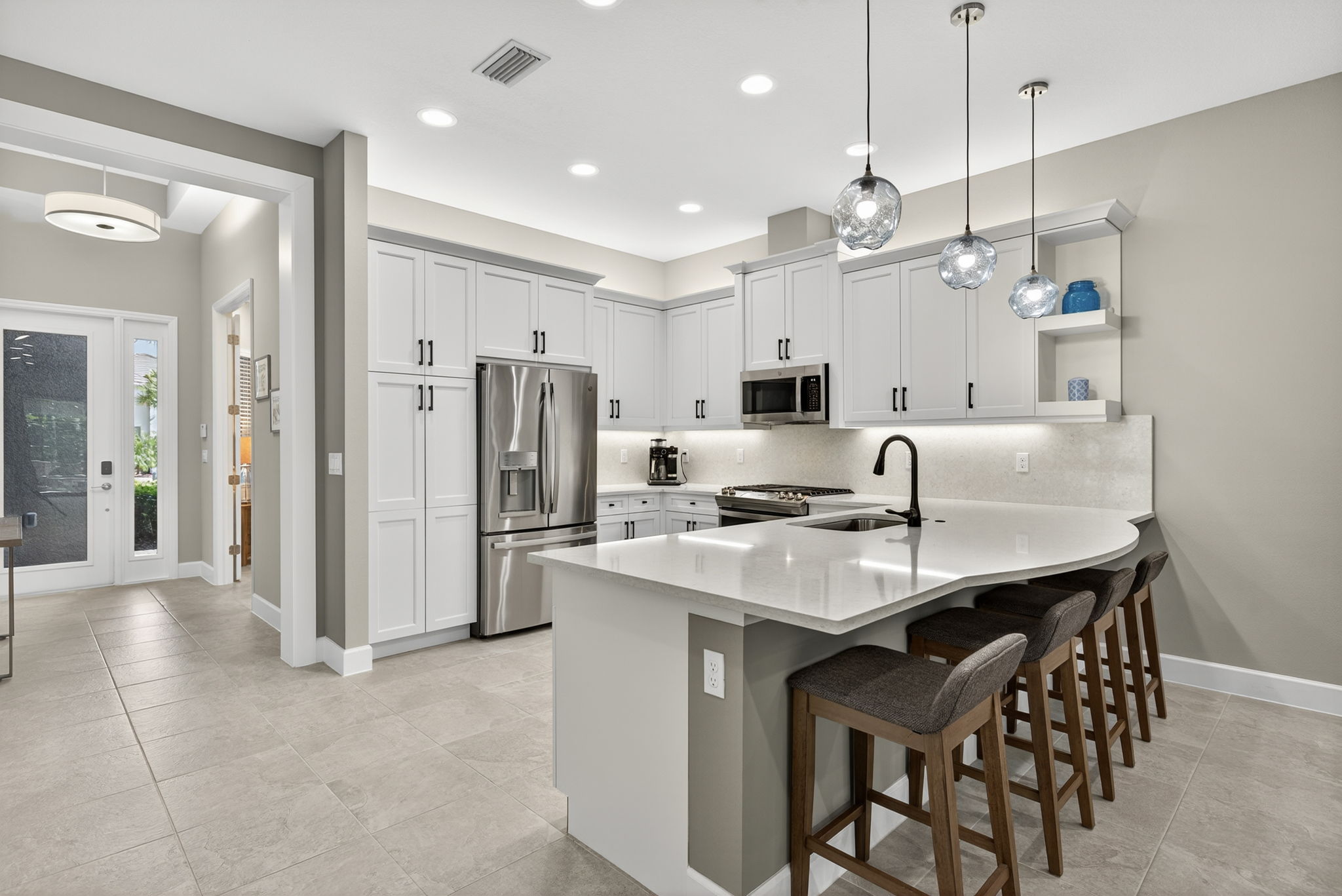 Generous pantry, upgraded French door fridge, modern hardware and soft close drawers all present here!