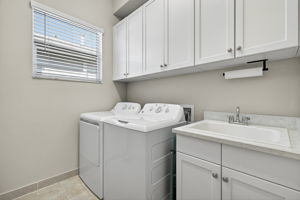 Storage here in cabinets! W/D convey! Laundry tub is an upgrade.