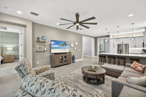 Note the custom millwork frames around the entry to the dining room and!