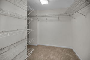 Primary Bedroom Walk-in Closet1a