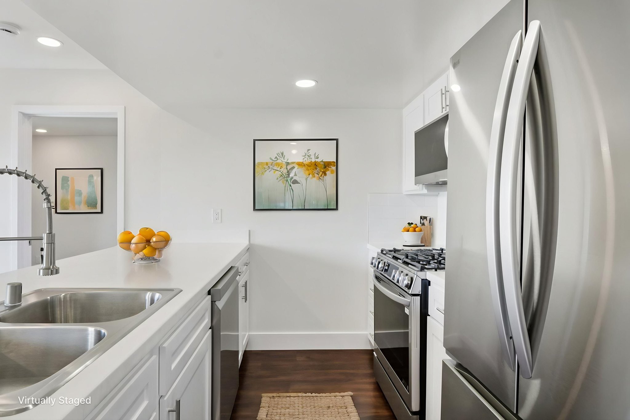 16550 Vanowen St unit 207-S0503-011 virtually staged.jpeg