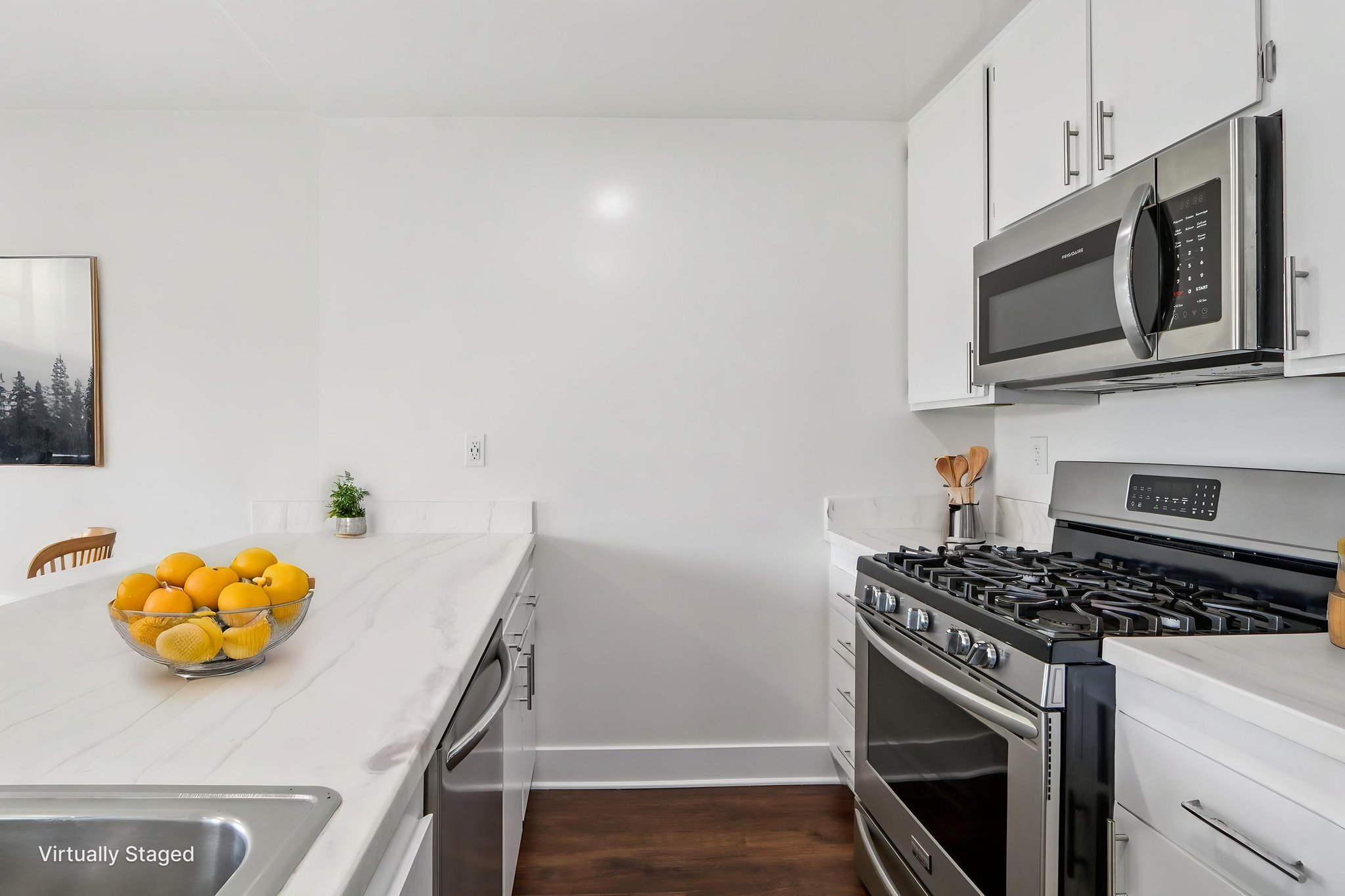 16550 Vanowen St unit 105-S0503-008 virtually staged.jpeg