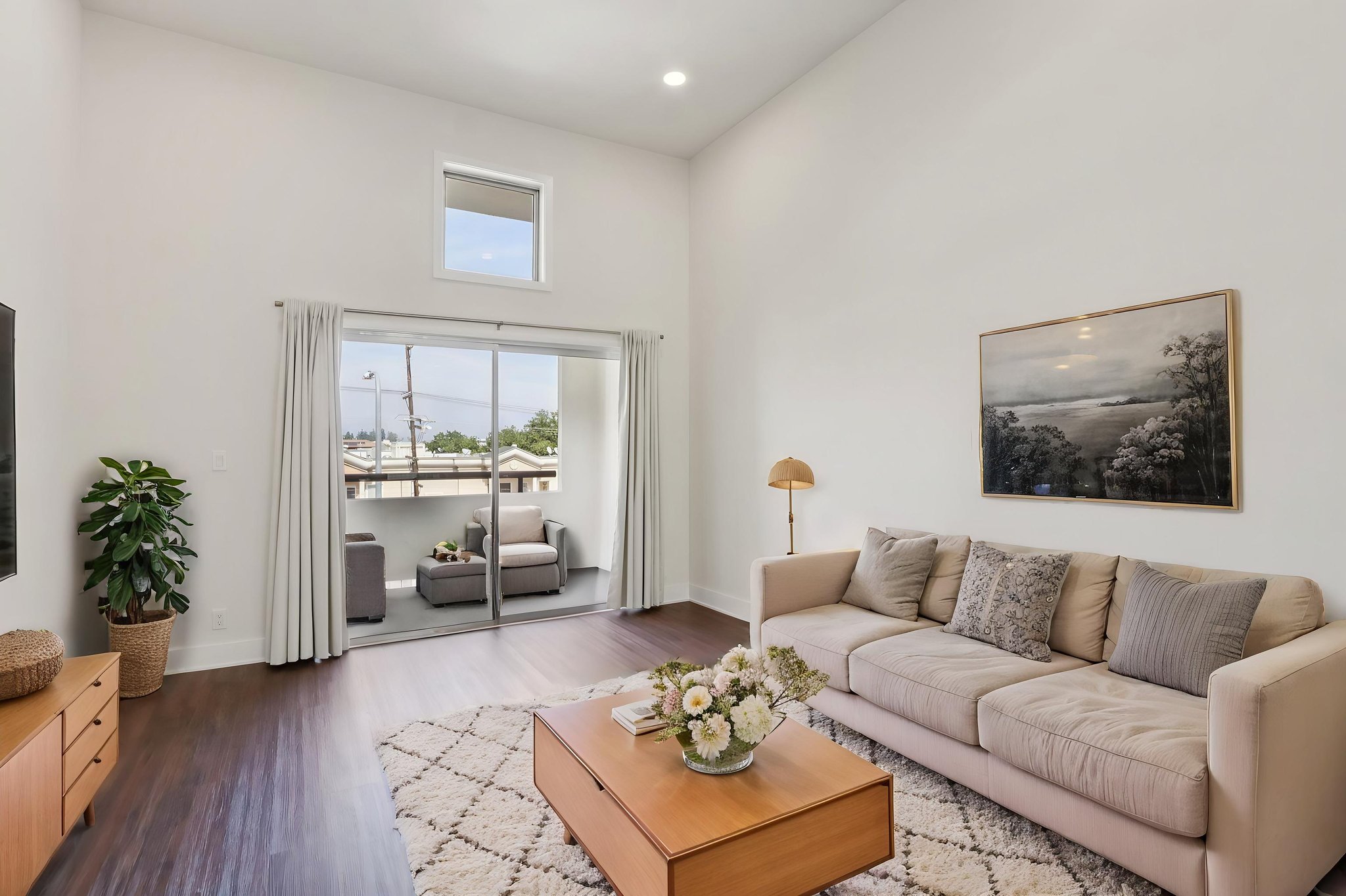 16550 Vanowen St unit 319-S0503-001 virtually staged.jpeg