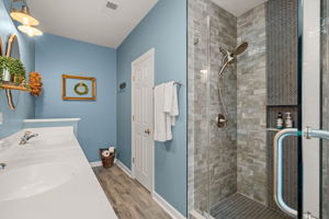 Master bathroom with tile shower