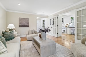 Living Room opening up to Kitchen and Family Room