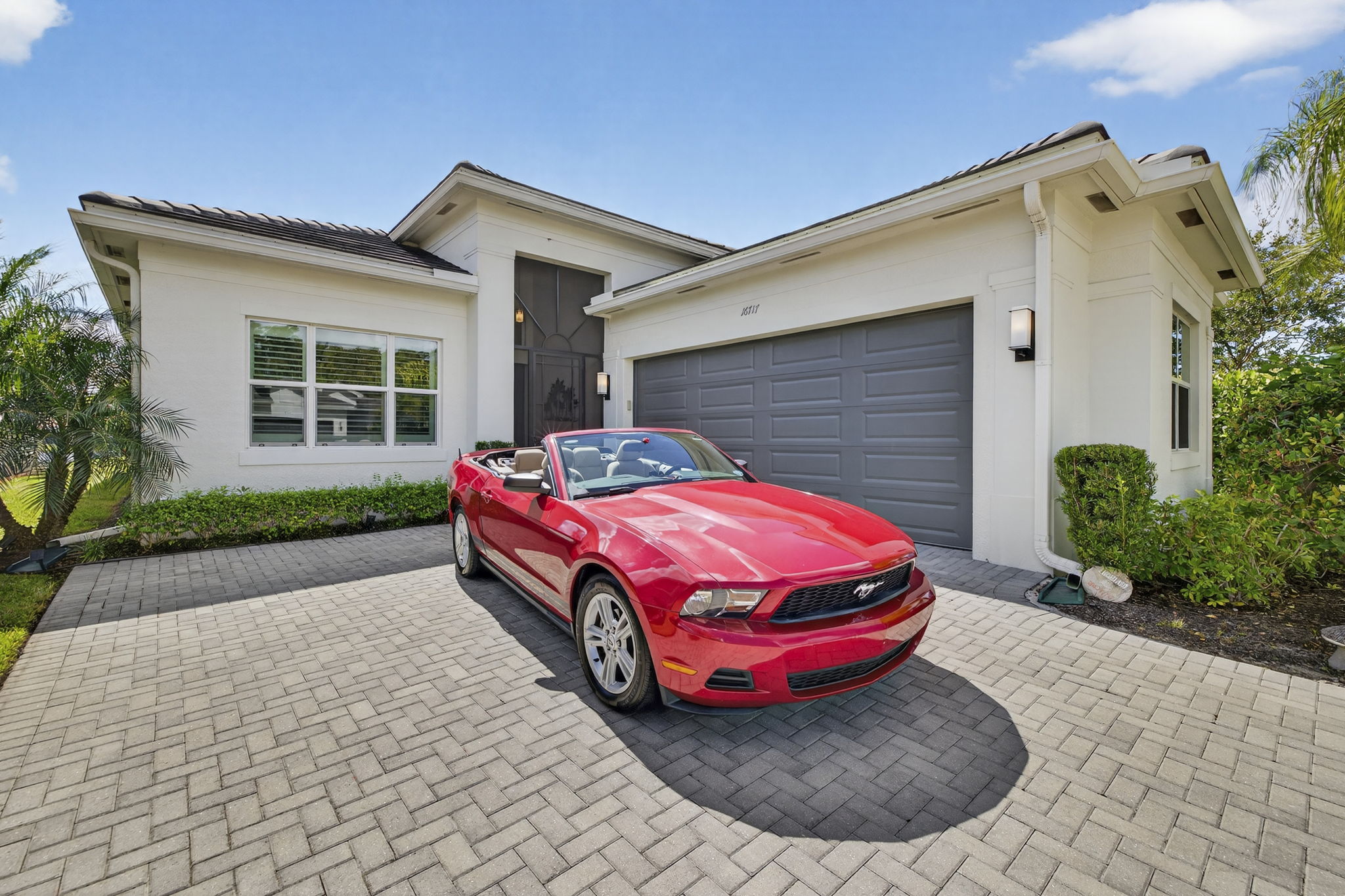 This red Mustang convertible may be purchased separately for you snowbirds!