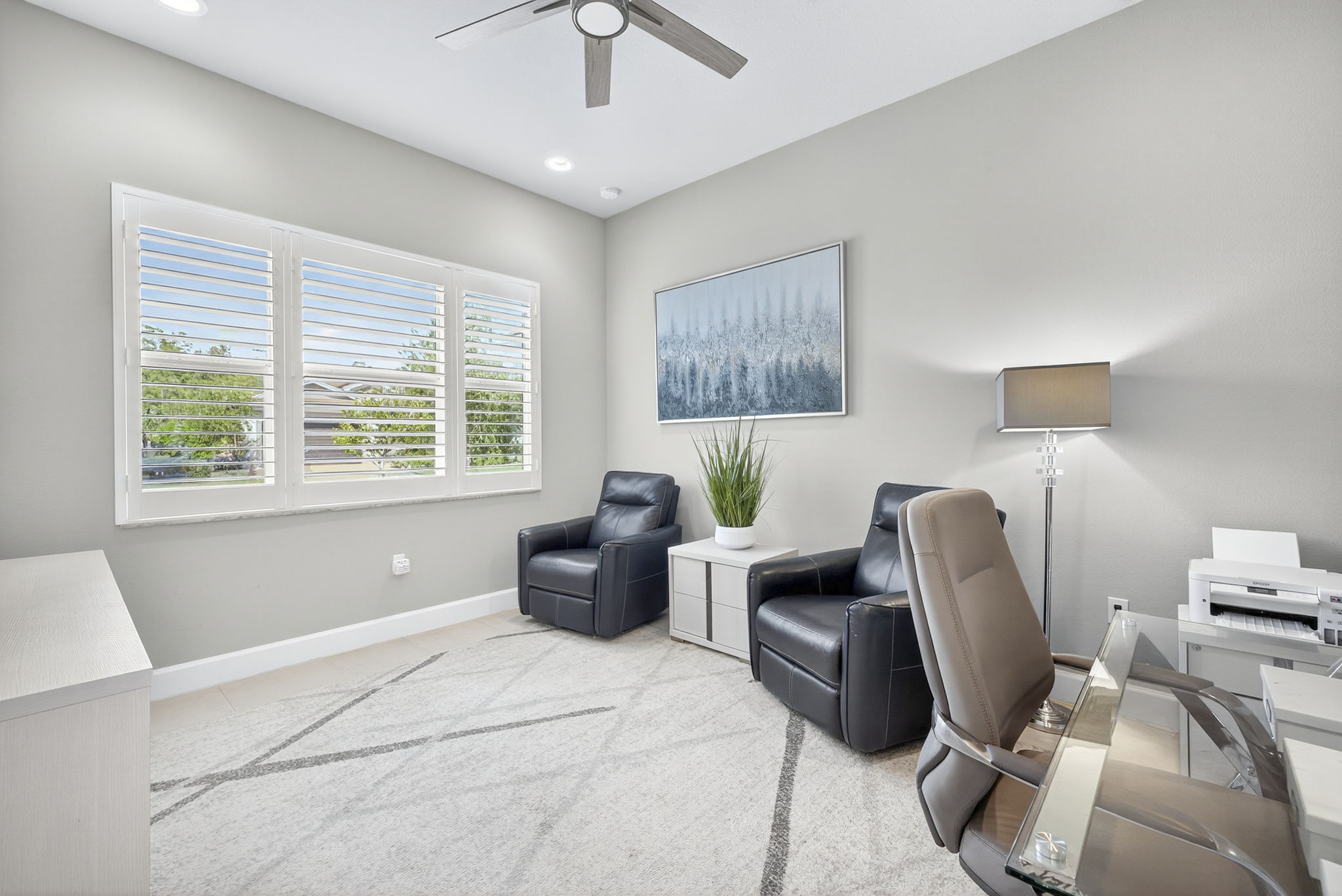 Located on the front of the house and to the left of the foyer, this den is super bright!