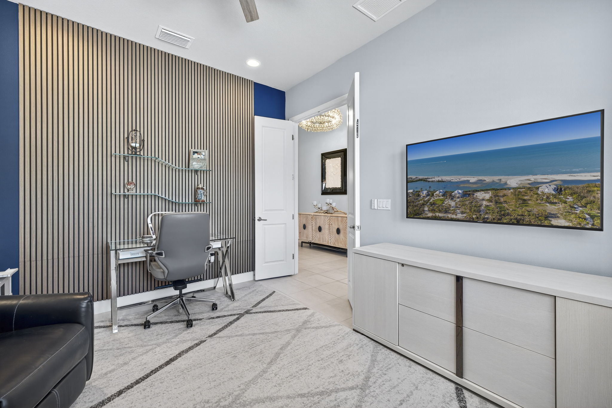 Wall behind the desk is dual purpose: pretty PLUS sound reducing!