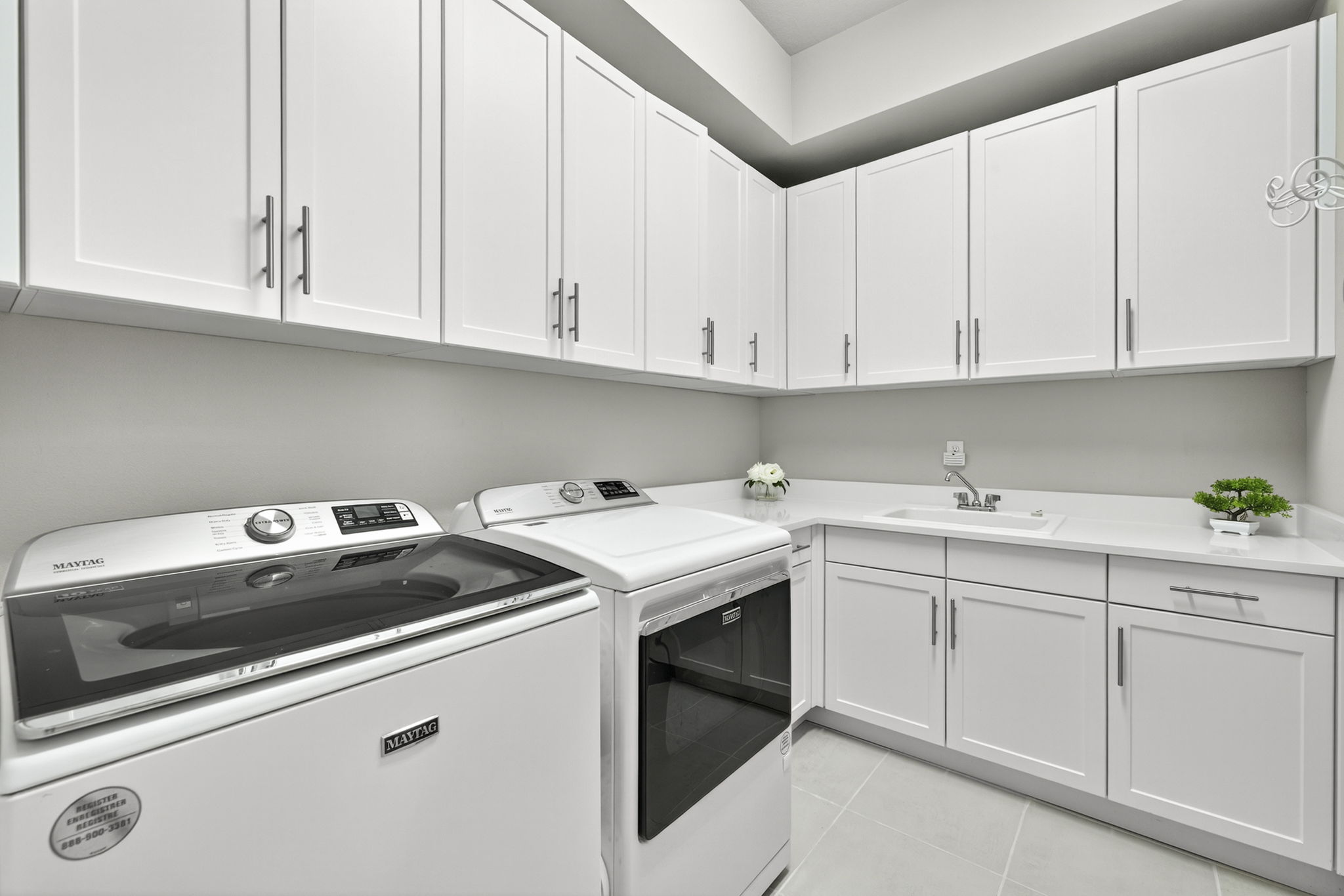 UPGRADED washer and dryer...plus a large utility tub and cabinets galore!!!