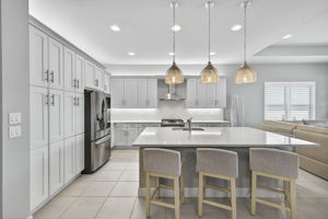 Island seats 5 (1 around the corner towards great room)