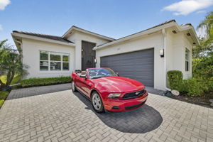 This red Mustang convertible may be purchased separately for you snowbirds!