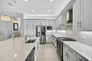 Elegance and gas cooking!!! Soft close drawers, microwave is air fryer and convection oven, too! Upgraded cabinets a huge plus!