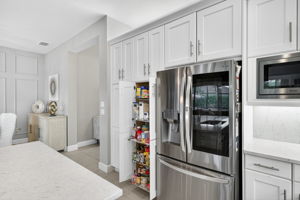 Upgraded appliances plus pull-outs in pantry and every lower level cabinet!