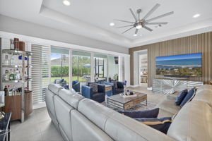 Looking from kitchen towards primary suite. Enough room to complete walk around sectional!