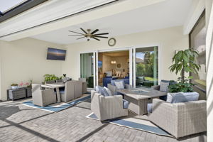 Enjoy the football games while lounging on your rear lanai! Center opening doors from great room...