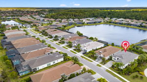 WELCOME HOME to your fabulous Riviera with screened front porch (great for cross breezes in colder months!)