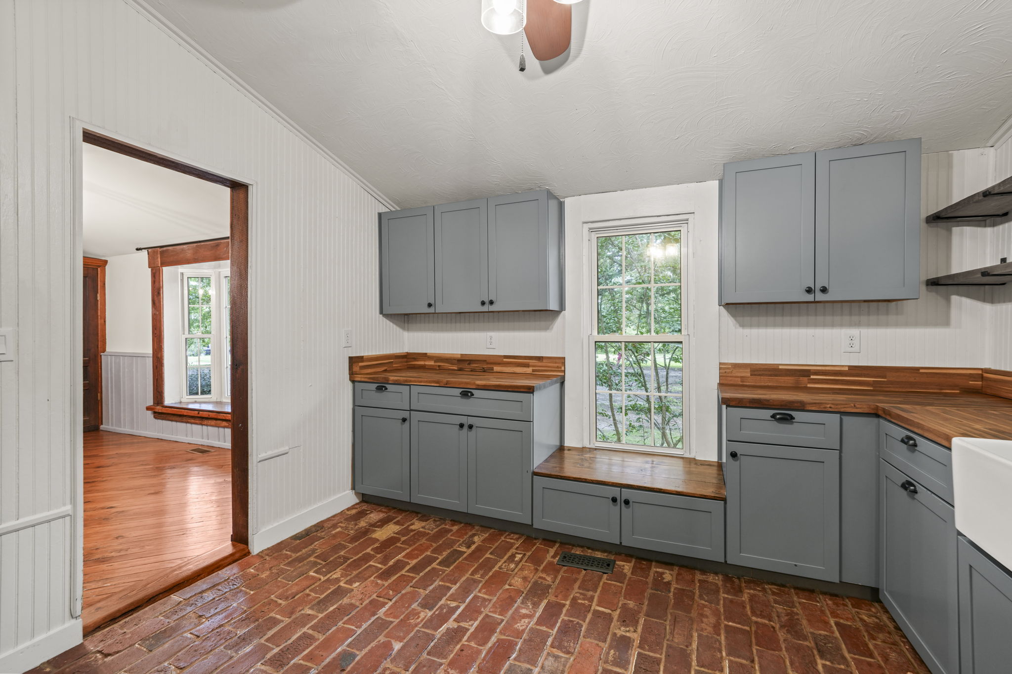 Brick Floor and Tons of Cabinets