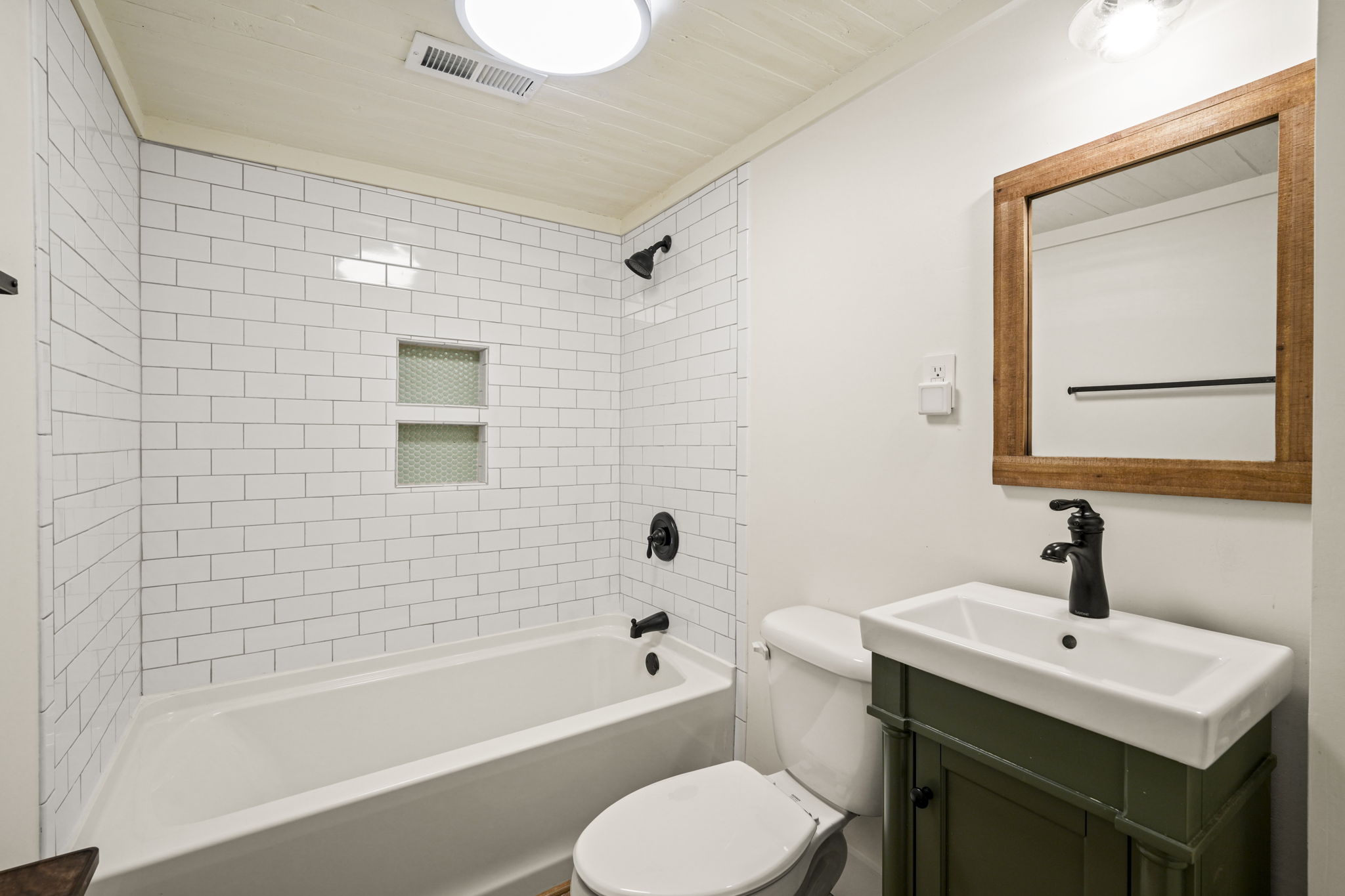 Upstairs Full Bath with Tile-Surround Tub/ Shower