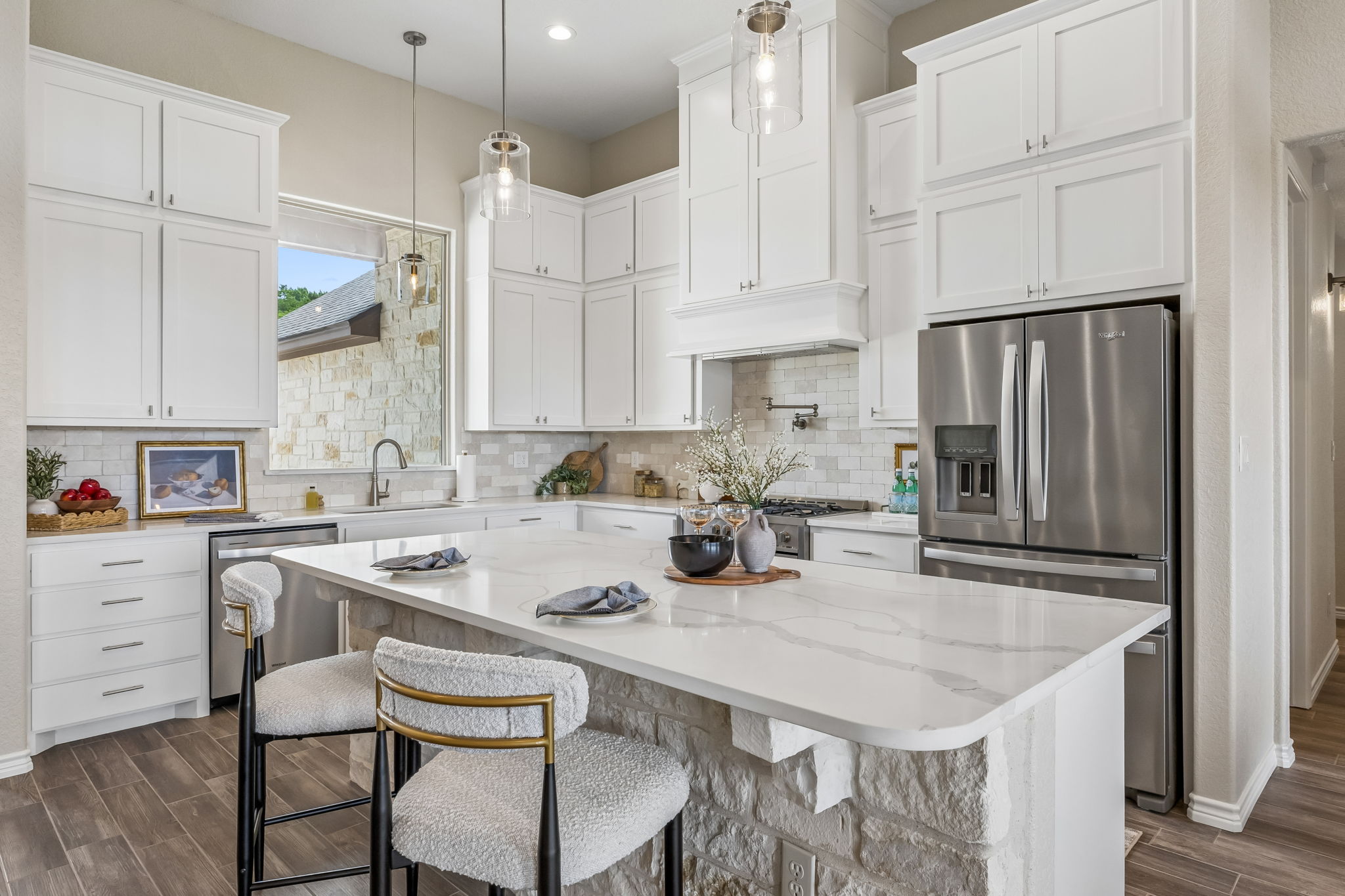 A large kitchen island for prepping or visiting.