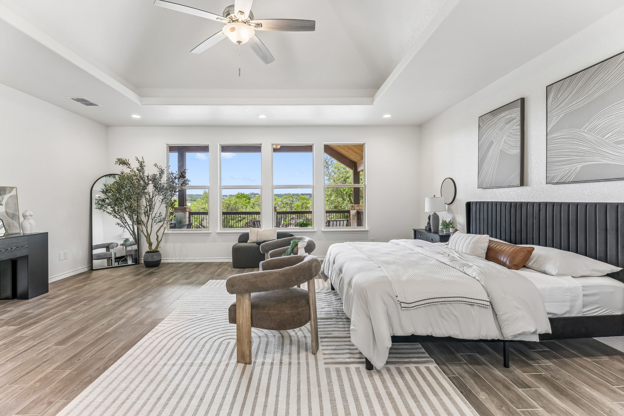 Primary bedroom with coffered ceilings.