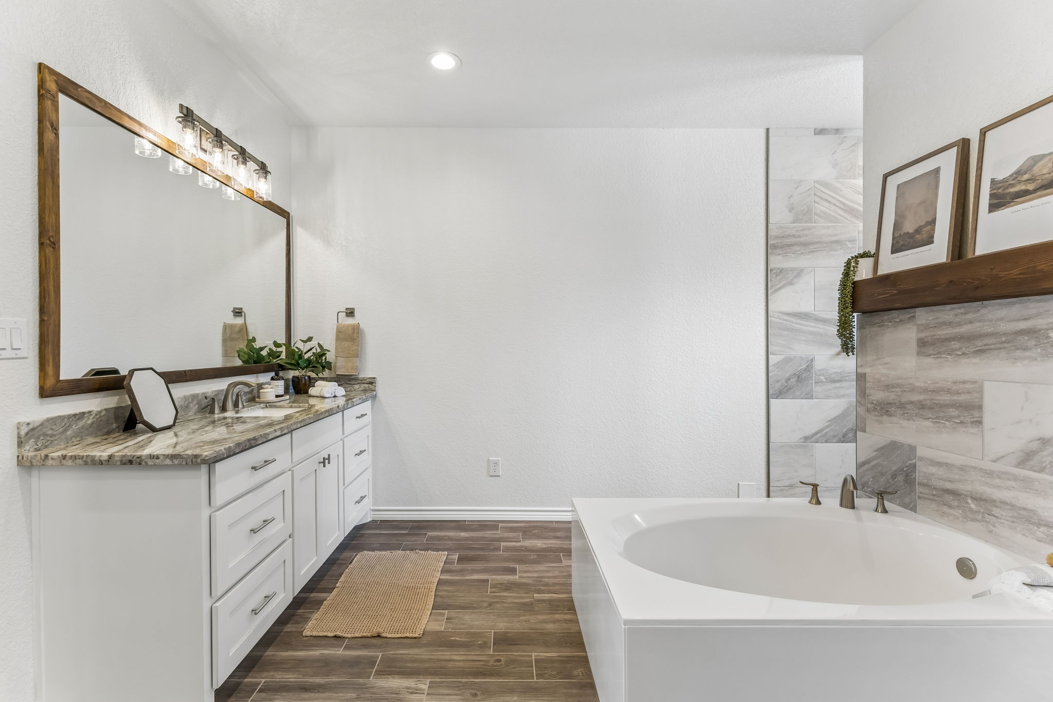 Soaking tub in the primary bathroom.