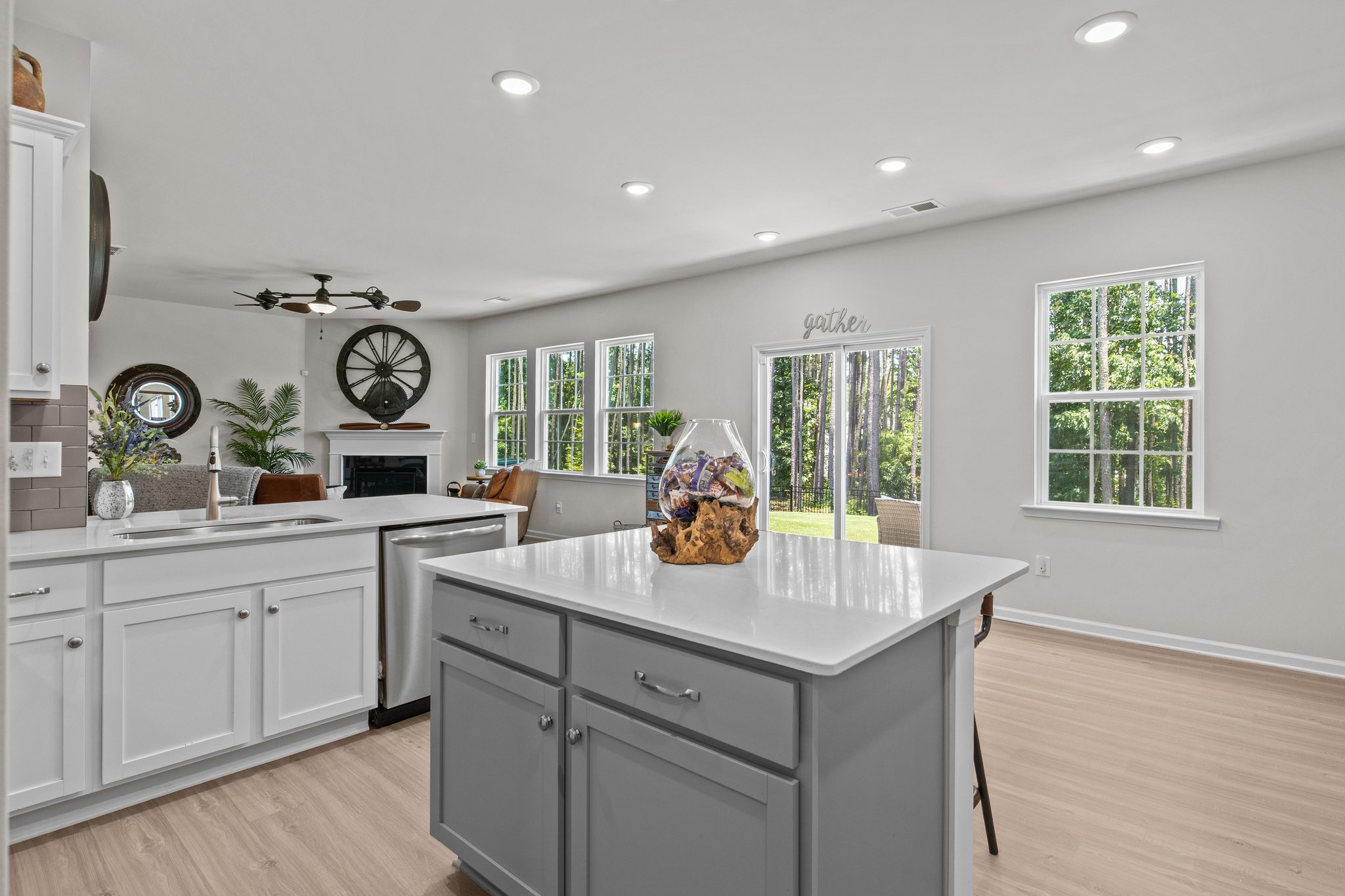So many windows and natural light adorn this kitchen area