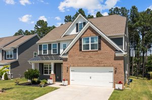 Brick & fiber cement exterior plus a two car garage