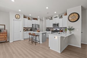 Roomy kitchen with quartz countertops