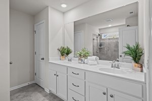 Primary bath with dual sinks and water closet