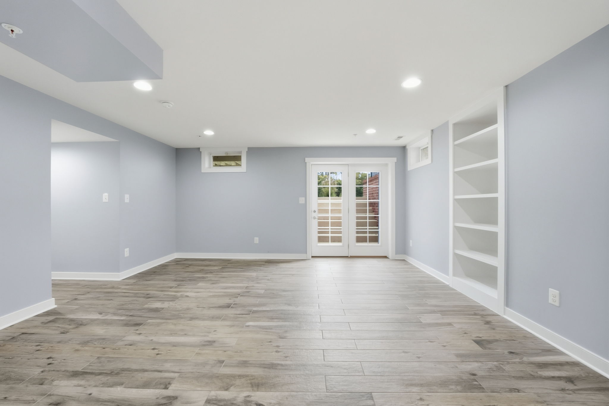 Spacious Rec Room w/walk-up stairs to back yard