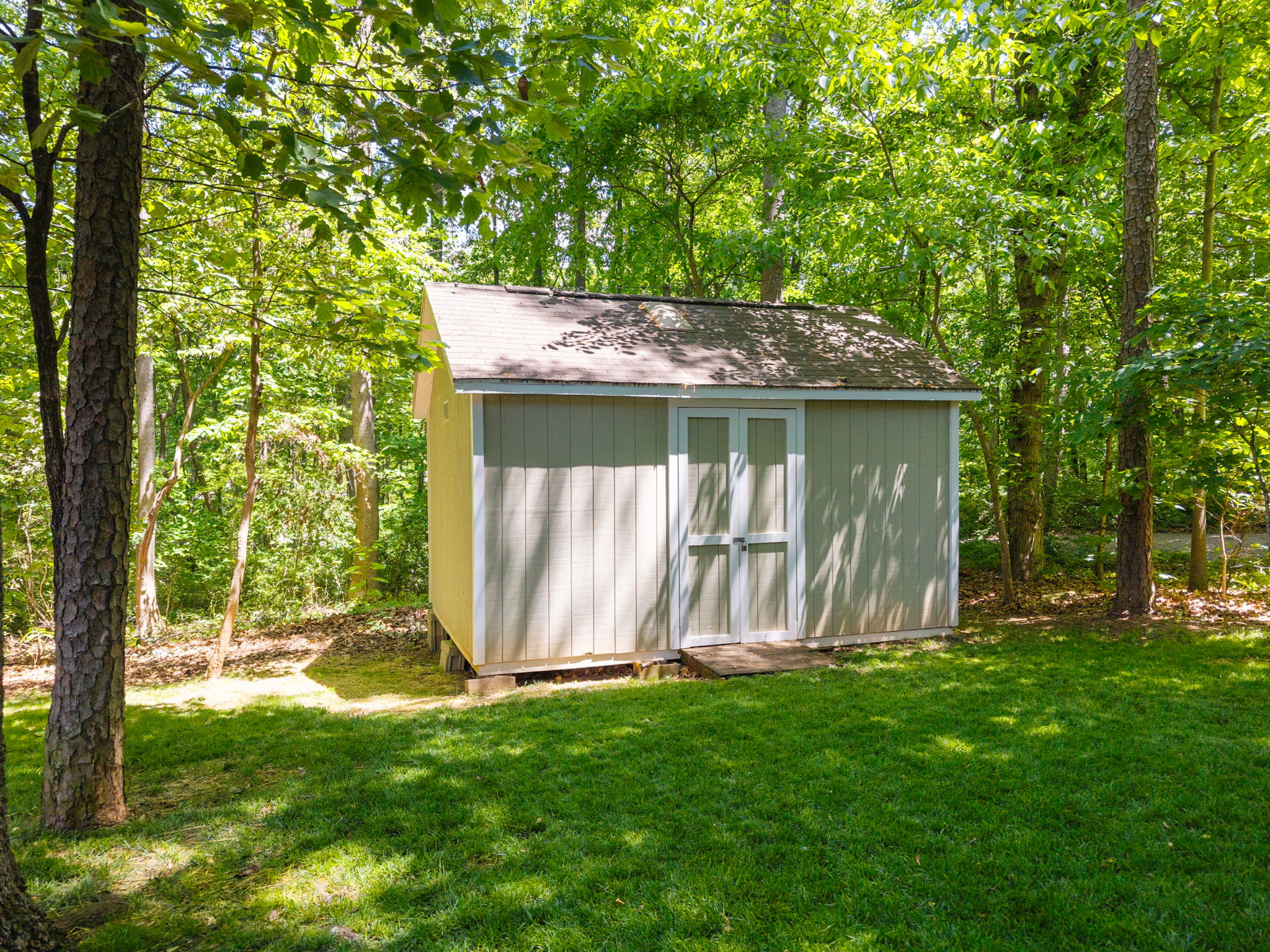 Free up garage space by storing your yard tools here