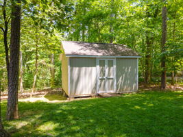 Free up garage space by storing your yard tools here