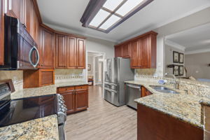 Kitchen fridge, washer and dryer remain