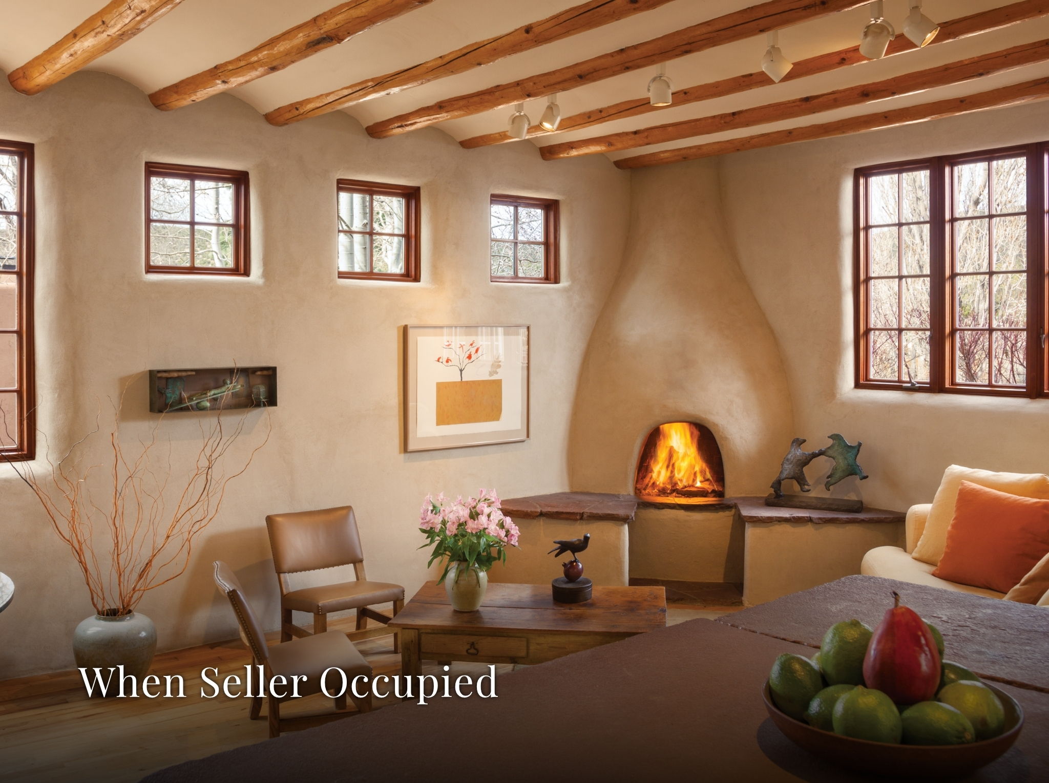 Living Room Adjacent to Kitchen shown as previously occupied for scale and inspiration.