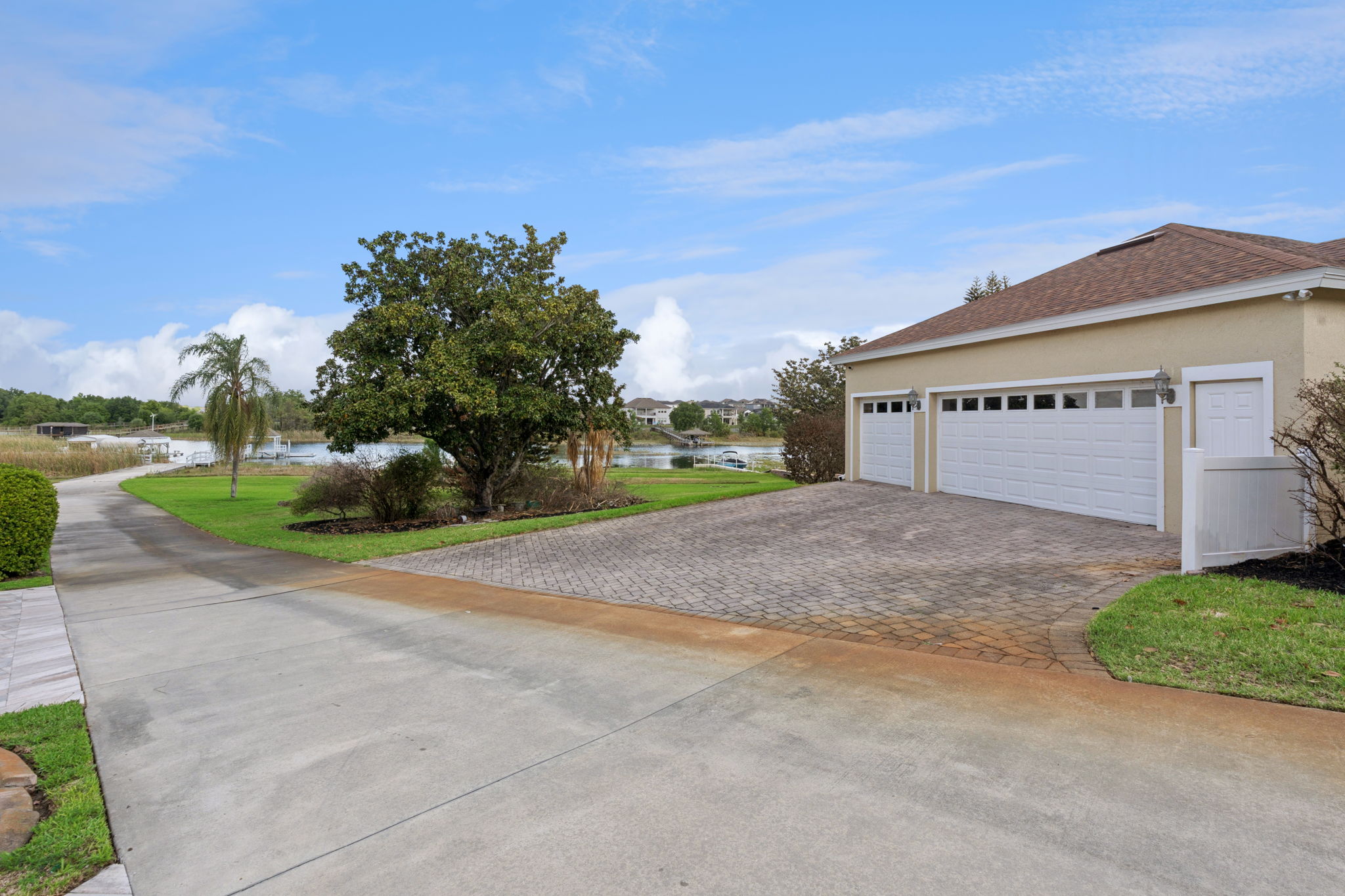 3 Car Garage & private community boat ramp adjacent