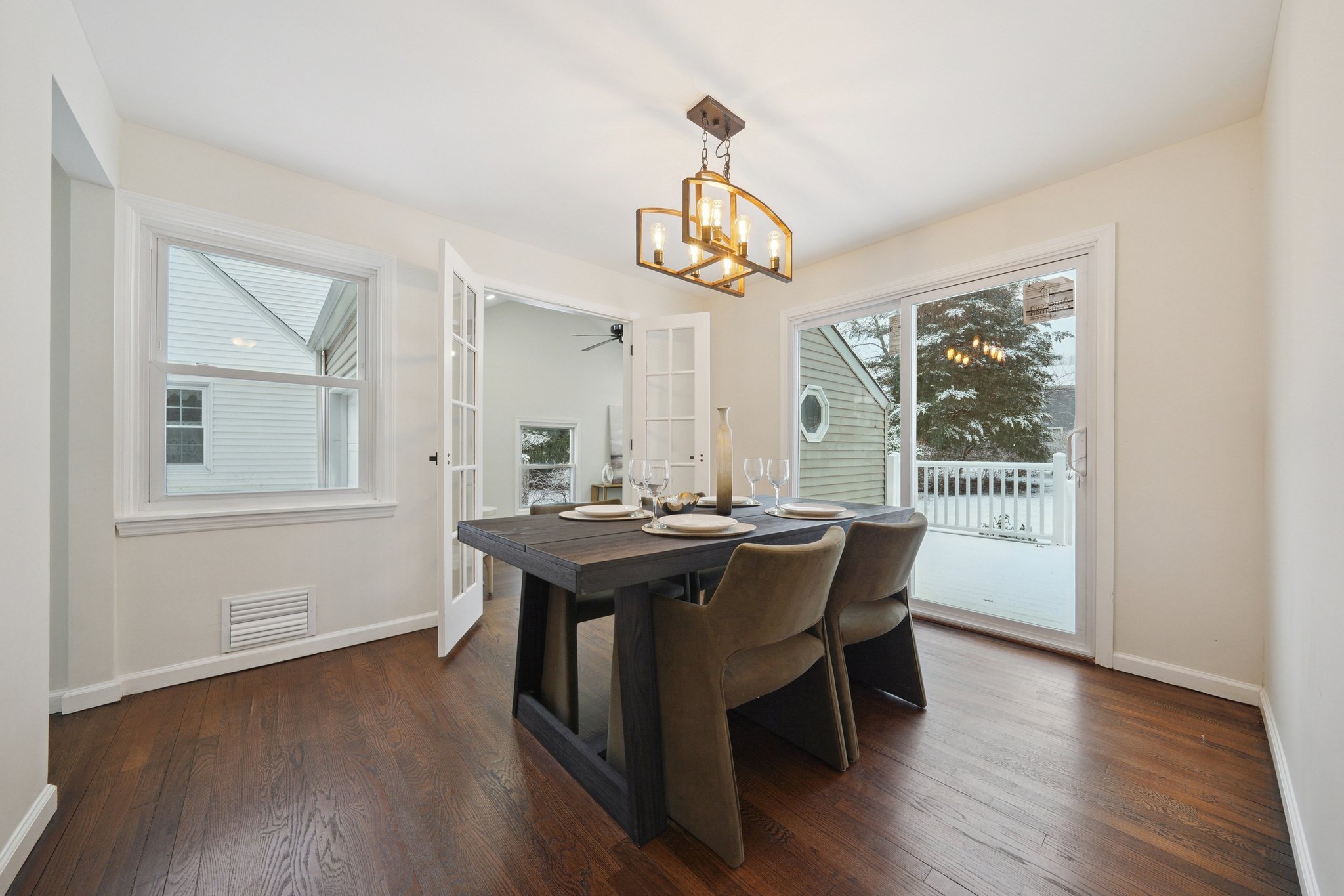Dining room with sliders to deck