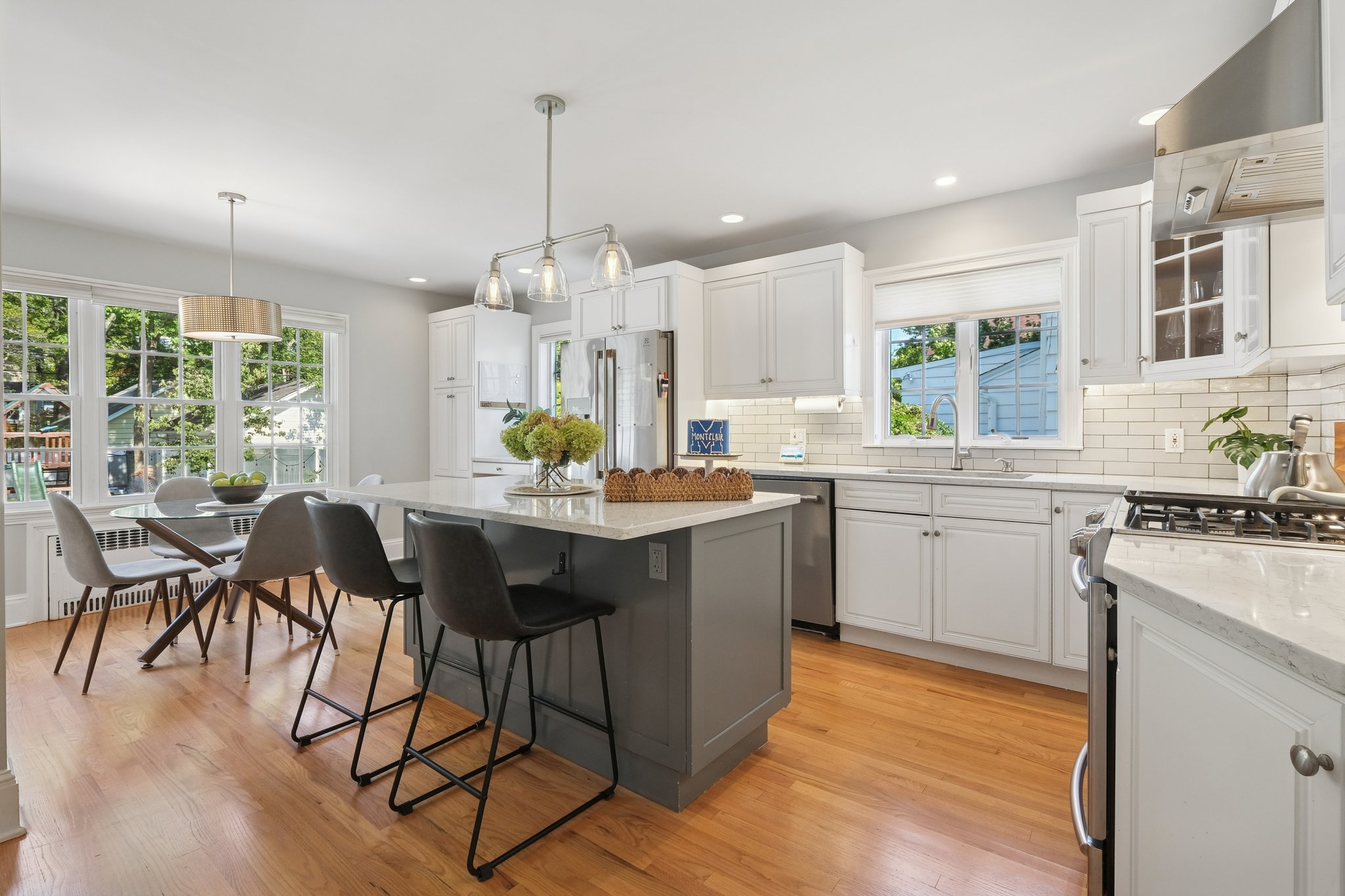 The heart of the home - a kitchen with a center island made for laughter, charcuterie spreads, and late-night cocktails.
