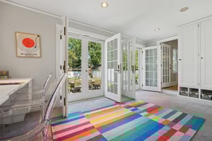 VMD00Right off the kitchen, this play room balances fun and function - a space for games, projects, and homework that opens through French doors to the bluestone patio.