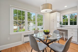 Cooking, sipping, gathering — all while keeping an eye on the backyard through those big, beautiful windows. This kitchen makes multitasking look effortless.