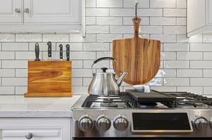 An updated eat-in kitchen with expansive island, beverage bar, and seamless connection to adjacent spaces - the ultimate hub for modern living.