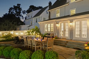 A patio where table talk, celebrations, and candlelight come naturally.