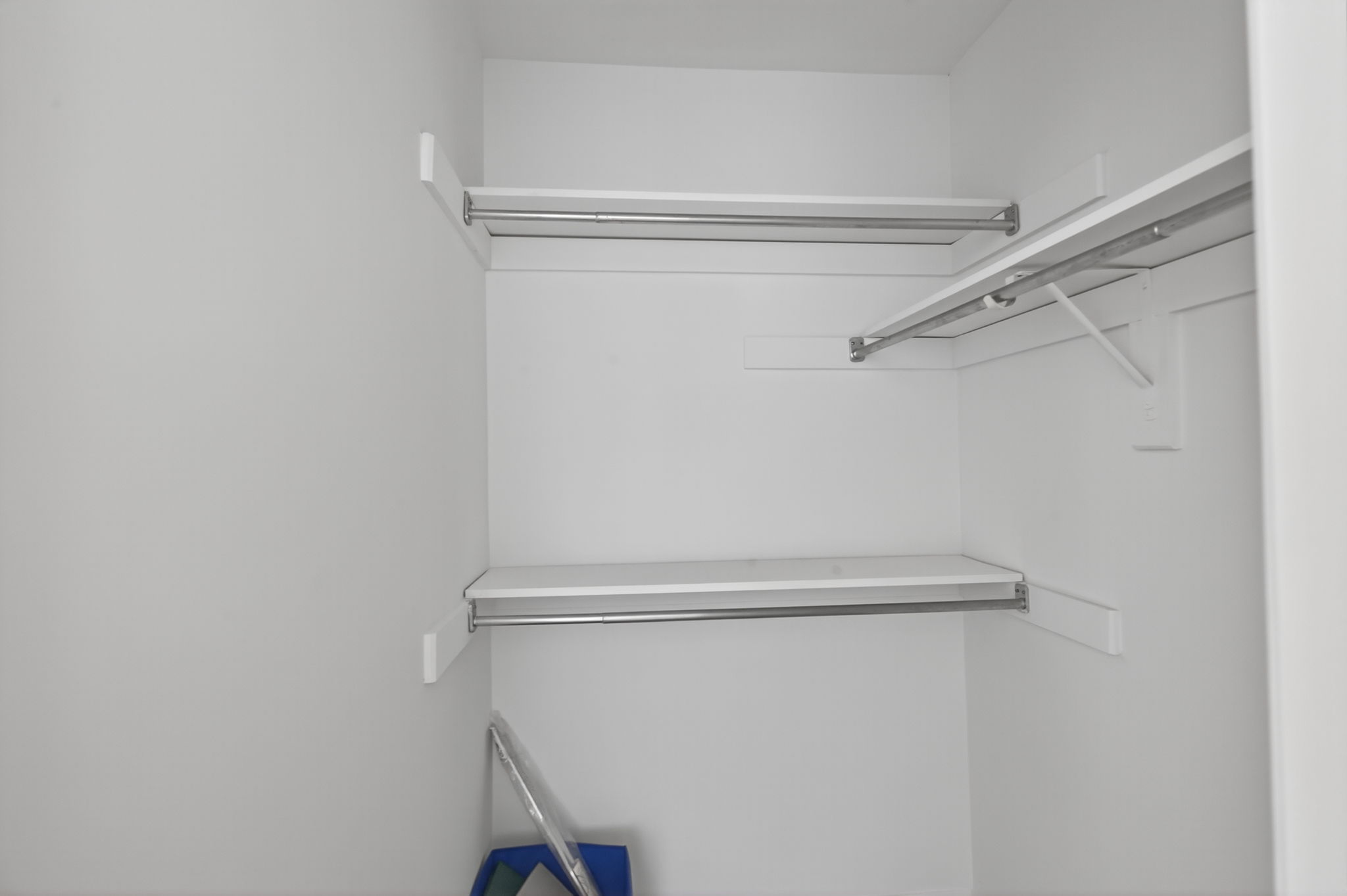 Spacious walk-in closet with ample storage.